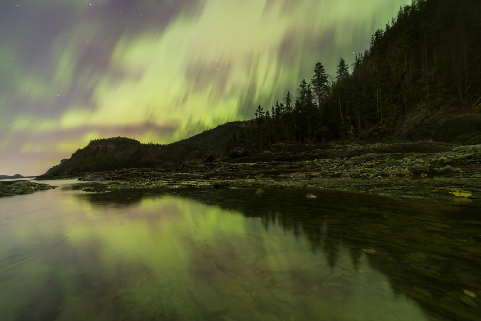 Reflection of Le Bic and the Northern Lights
